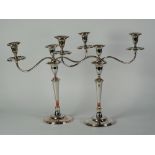 A PAIR OF GEORGE III OLD SHEFFIELD PLATE CANDELABRA, the three light twin branch arms removable from