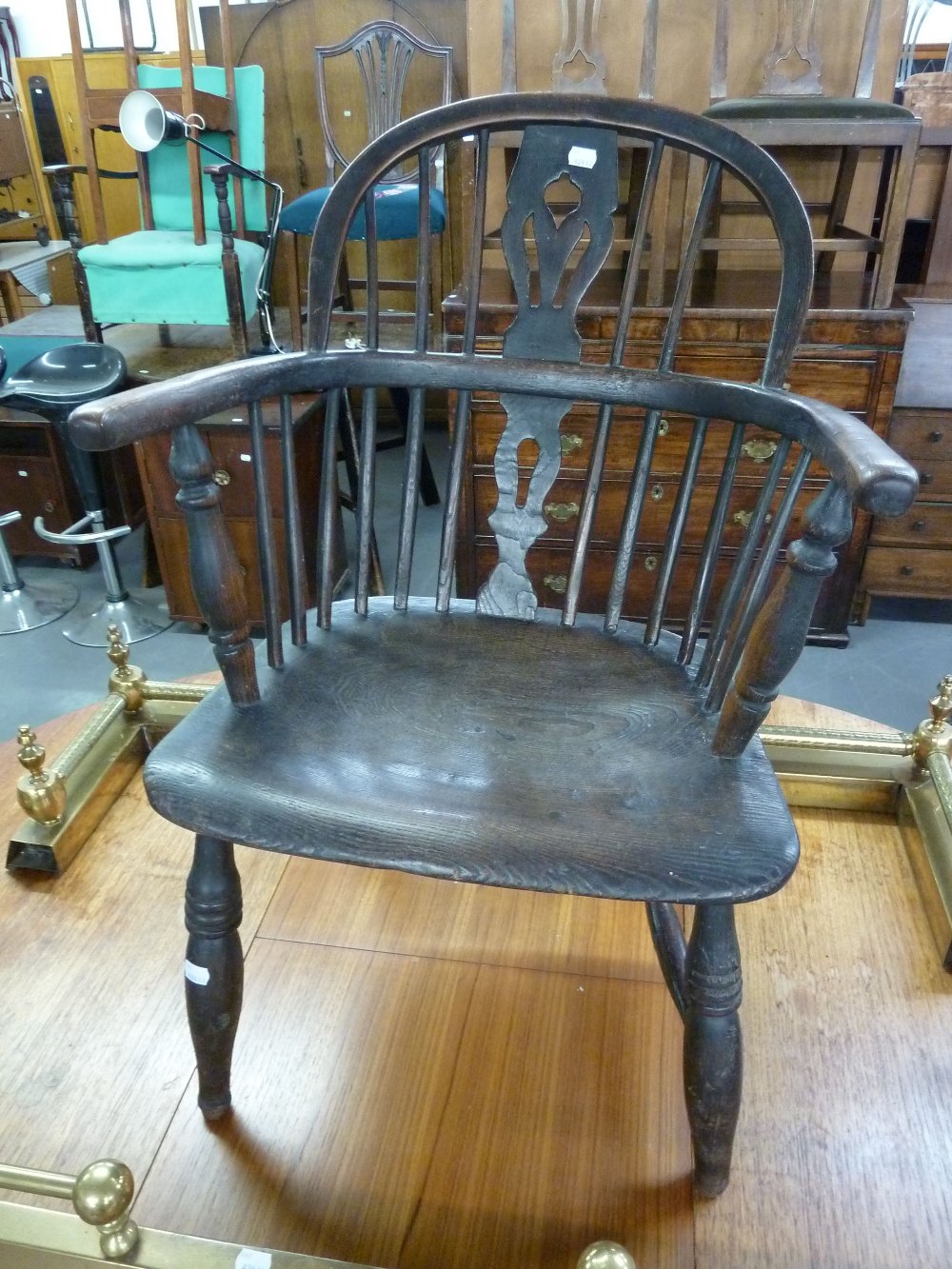 A TWENTIETH CENTURY WINDSOR STYLE CHAIR (CUT DOWN)