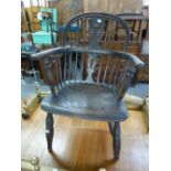 A TWENTIETH CENTURY WINDSOR STYLE CHAIR (CUT DOWN)