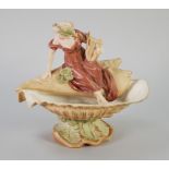ROYAL DUX ART NOUVEAU PORCELAIN FIGURAL BOWL, painted in muted tones and gilt and modelled as a