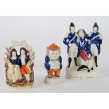 19th CENTURY STAFFORDSHIRE FIGURAL POTTERY SALT AND PEPPER POT, modelled as a portly gentleman