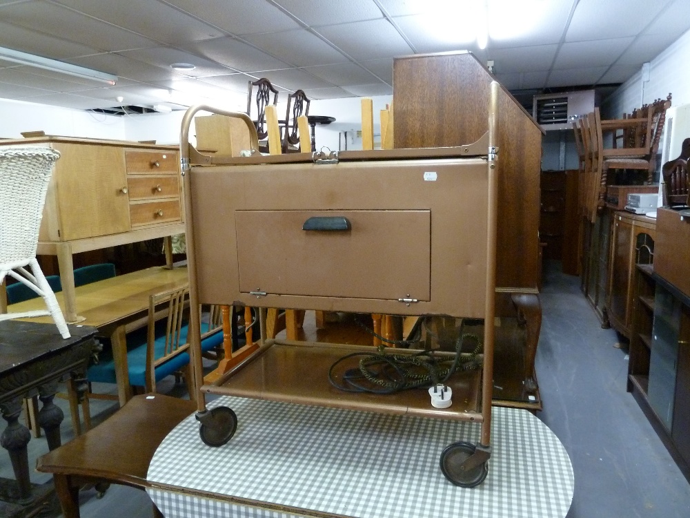 ELECTRIC HOT FOOD TROLLEY AND TWO INVALID BED TABLES AND A KITCHEN TABLE