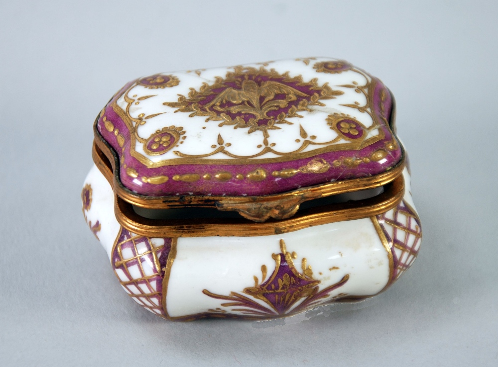 'SEVRES' PORCELAIN OBLONG BOMBE BOX with hinged lid, with gilt metal border mounts and hinge, the