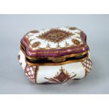 'SEVRES' PORCELAIN OBLONG BOMBE BOX with hinged lid, with gilt metal border mounts and hinge, the