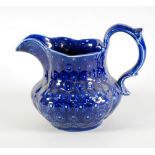 19th CENTURY ENGLISH DEEP BLUE GLAZED POTTERY LARGE PYRIFORM JUG, embossed all over with flower