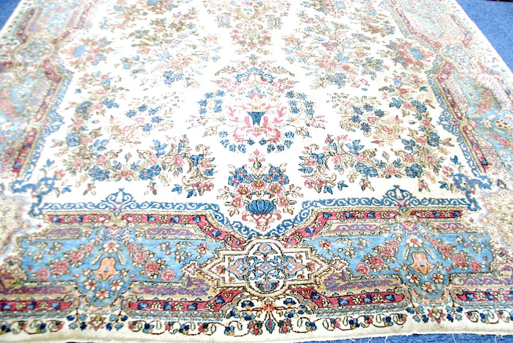 LARGE KIRMAN PERSIAN CARPET, with central floral medallion with pendants and an all over design of