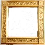 NINETEENTH CENTURY GILT GESSO WALL MIRROR, the later bevel edged oblong plate in a moulded frame