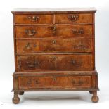 EARLY EIGHTEENTH CENTURY INLAID AND CROSSBANDED WALNUT CHEST OF DRAWERS, the moulded oblong top with