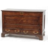 LATE 18th CENTURY OAK AND MAHOGANY CROSSBANDED DOWER CHEST, the moulded oblong two plank top above a