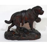 LATE 19th/EARLY 20th CENTURY SWISS BLACK FOREST TYPE CARVED WOODEN ST. BERNARD, a barrel around