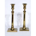 PAIR OF 19th CENTURY BRASS CANDLESTICKS, on square bases, 11 1/4" (28.5cm) high