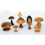 COLLECTION OF TWENTIETH CENTURY AND CARVED WOOD ORNAMENTS IN THE SHAPE OF MUSHROOMS AND OTHER FUNGI,