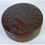 ORIENTAL TINNED COPPER ANTIMONY BOX, circular form, the cover embossed with a displaying peacock, 3"