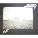 H.M.S. LONDON SHIPS SOUVENIR BLACK FABRIC CLAD PHOTOGRAPH ALBUM, the front cover embossed H.M.