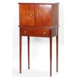 1960's MAHOGANY COLLECTORS CABINET ON STAND, the moulded oblong top above a pair of cupboard