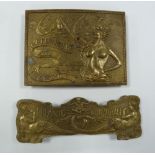 TWO DEANE AND ADAMS MINT FACSIMILE BRASS CAST BUCKLES