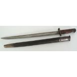 1907 PATTERN BRITISH SWORD BAYONET, having single edge fullered blade, 17" long, the hilt with