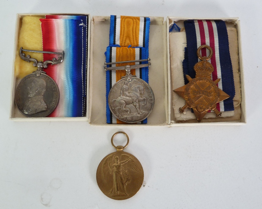 MILITARY MEDAL GROUP OF FOUR GEORGE V WORLD WAR I MEDALS AWARDED TO 9077 BOMBADIER J.F. SMITH, 108/