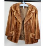 LADY'S PALE BROWN MINK SHORT JACKET, fold over collar with ornate button fastening