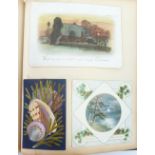 VICTORIAN PROPRIETARY CHRISTMAS CARD ALBUM, with green and gilt cloth pictorial covers, CONTAINING A