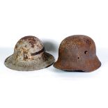 GERMAN M1916 DESIGN WWI TIN HELMET, very rusty and lacking any fittings and a BRITISH STYLE STEEL