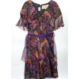 AN EARLY 1970's DRESS, designed by Wanda for Leshgold, black pure silk with psychedelic printed