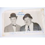 STAN LAUREL AND OLIVER HARDY SIGNED BLACK AND WHITE FAN CLUB/PROMOTIONAL PHOTOGRAPH postcard size in