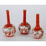 THREE JAPANESE KUTANI GLOBE AND SHAFT BOTTLE VASES, 7 «" (19cm) high (3)