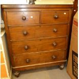 A VICTORIAN MAHOGANY TALL CHEST OF DRAWERS OF TWO SHORT OVER THREE LONG, TURNED HANDLES ON SQUAT