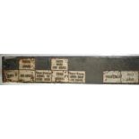 ELEVEN CAST IRON SIGNAL BOX LEVER PLATES OBLONG WITH RAISED LETTERING and rounded edges, to