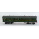 TWO SCRATCH BUILT '0' GAUGE CARRIAGES comprising an all third class composite coach in green