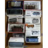 APPROXIMATELY 20 MADE-UP MAINLY 'SLATERS' '0' GAUGE PLASTIC GOODS WAGON KITS each wagon housed in