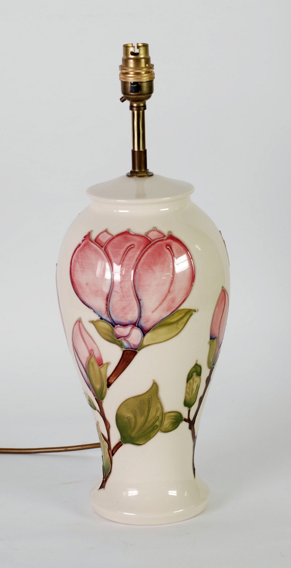 WALTER MOORCROFT MAGNOLIA PATTERN TUBE LINED POTTERY ELECTRIC TABLE LAMP BASE, painted in tones of