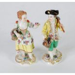 PAIR OF TWENTIETH CENTURY MEISSEN PORCELAIN FIGURES, modelled as a maid and her companion, on gilt