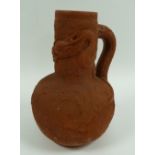 YIXING, CHINESE MOULDED REDWARE JUG, of globe and shaft form, moulded with a three toed dragon and