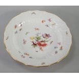 MEISSEN PORCELAIN DESSERT PLATE with moulded border and wavy gilt edge, the centre painted with a