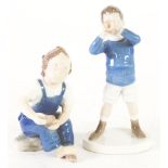 TWO MODERN BING & GRONDAHL, DANISH PORCELAIN FIGURES OF CHILDREN, comprising a boy standing