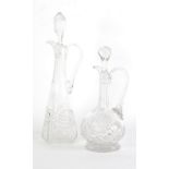 TWO CUT GLASS CLARET JUGS WITH STOPPERS, one of footed baluster form with tall, slender neck, 13" (