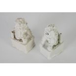 A PAIR OF POSSIBLY SEVENTEENTH CENTURY CHINESE BLANC DE CHINE POTTERY MODELS OF BUDDHISTIC LION