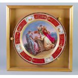 VIENNA PORCELAIN CIRCULAR PLAQUE, painted with a scene of four female figures paying tribute, with