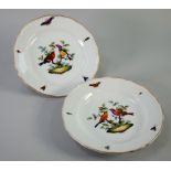 PAIR OF MEISSEN PORCELAIN PLATES, the centre of each painted in polychrome wit two birds perched