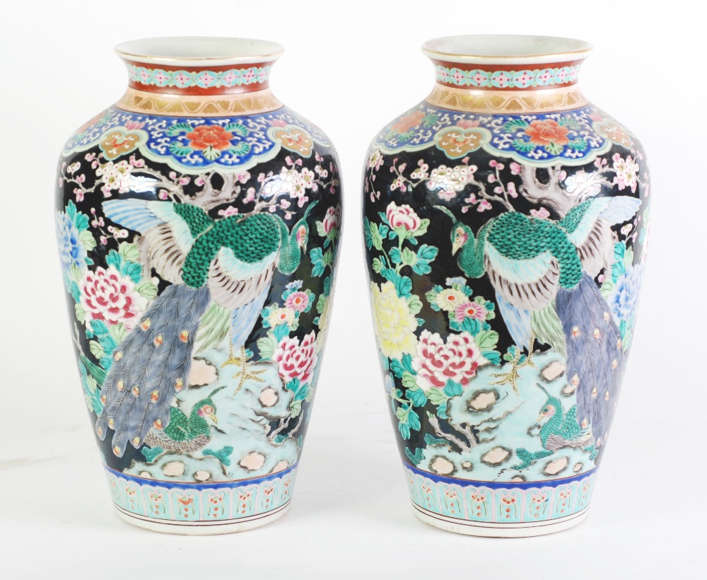 A PAIR OF EARLY TWENTIETH CENTURY CHINESE FAMILLE NOIRE ENAMELLED PORCELAIN VASES, each of ovoid