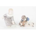 TWO MODERN BING & GRONDAHL DANISH PORCELAIN FIGURES OF CHILDREN comprising a seated boy with dog, (