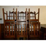 A SET OF THREE 19th CENTURY OAK DINING CHAIRS WITH BARLEY TWIST SUPPORTS TO THE OPEN BACK, PAD
