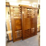 A 20TH CENTURY MAHOGANY DOUBLE BED HEAD AND END, OF SLATTED FORM WITH CENTRAL PANEL