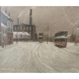 •ARTHUR DELANEY (1927-1987) OIL PAINTING ON BOARD A Northern street scene in winter with trams and