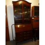 TWENTIETH CENTURY MAHOGANY BUREAU BOOKCASE WITH THREE LONG DRAWERS, ON CABRIOLE SUPPORTS