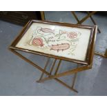 A WALNUTWOOD OBLONG TEA TRAY WITH GLASS TOP AND THE BUTLERS FOLDING STAND