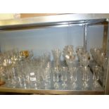 A PLAIN GLASS LARGE DECANTER, A SET OF SIX CUT GLASS TUMBLERS VARIOUS STEM WINE GLASSES AND SUNDRY