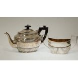 LATE NINETEENTH CENTURY SCOTTISH SILVER OVAL TEAPOT, with reeded and semi gadroon decoration,